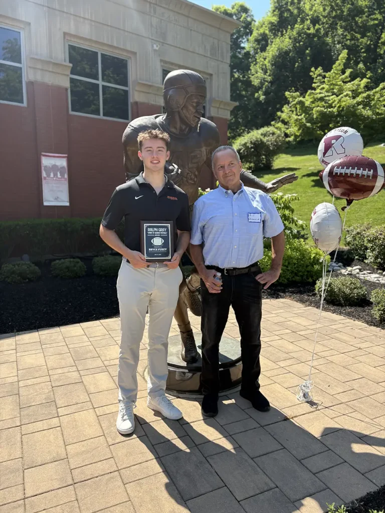 Bryce Furey Holding the 2026 Ralph Gray Award